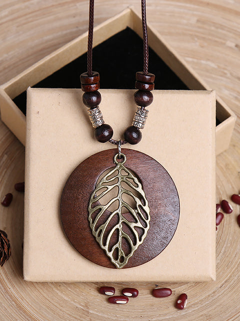 Collier pendentif en bois de feuille d'alliage vintage