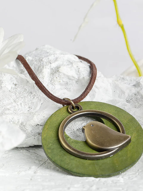 Collier pendentif en bois rond en forme d'oiseau en métal mignon